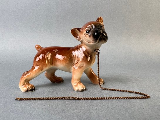 Porcelain Boxer Pup With Leash.