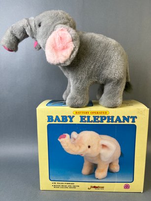 Walking And Trumpeting Baby Elephant Doll.