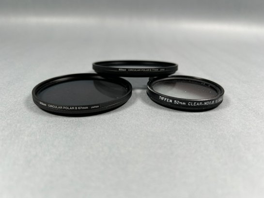 Three Nikon And Tiffen Camera Filters With Case