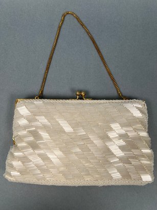 Off White Beaded Clutch With Gold Chain And Ball Closure.
