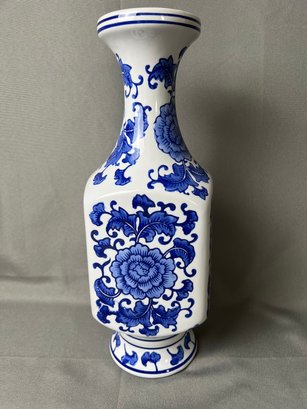 Blue And White Floral Vase.