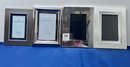4 Silver Picture Frames.