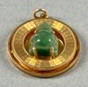 14k Gold Pendant With A Jade Stone Buddha