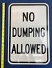 No Dumping Allowed Road Sign