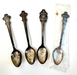 Four Rolex Spoons