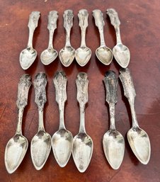 12 Matching Sterling Silver Relish Spoons.