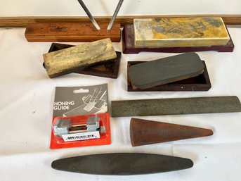Lot Of 8 Sharpening Implements, 6 Whetstones, 1 Sharpening Stick, 1 Honing Guide. ,