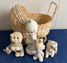 4 Porcelain Figures And A Wicker Baby Carriage. -Precious Moments & Windstone