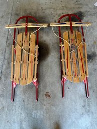 Two Sears Kids Sleds