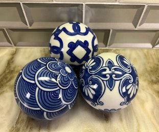 Three Blue And White Decorative Balls