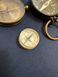 Four Vintage Compasses