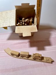 Box Of Wooden Train Track And Cars