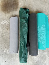 Three Yoga Mats And Chair