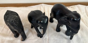 Small Herd Of Elephants. 2 Small Are Carved Wood, Large Possible Soapstone.