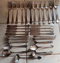 32 Silver Plate Flateware, 12 Matching Forks, 8 Matching Butter Knives, 6 Relish Forks, 3 Spoons, 2 Ladles