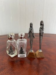 2 Bottles  And 2 Statues Depicting Our Lady Of Lourdes.