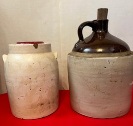 Old Clay Whiskey Jug And Cookie Jar. Some Cracks On Jug Some Chips On Jar.