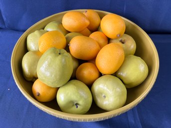 Large Ceramic Bowl Of Plastic Lemons And Apples.