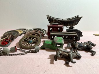 Lot Of Vintage Cast Iron Toy Parts Including A Caboose, Wagon And Coal Car.