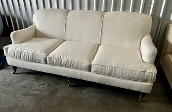 White Sofa With Front Roller Legs