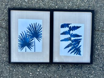 Two Black Frames With Blue Flowers