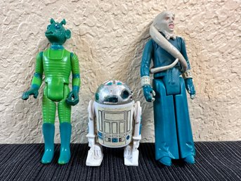 Three Star Wars Figures R2D2