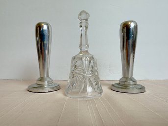 Bell And Two Candlesticks