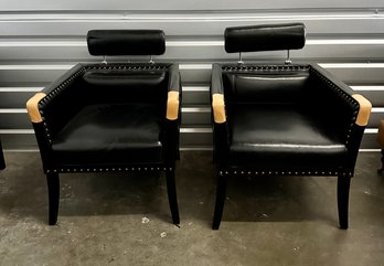 Two Black Faux Leather Chairs