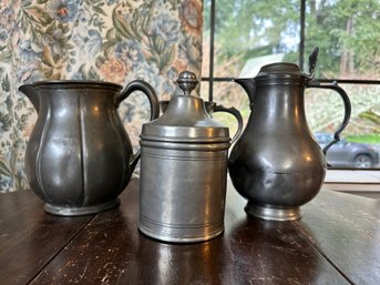 Four Antique Pewter Pitchers And Container