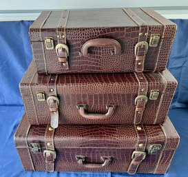 3 Faux Alligator Decorative Suitcases.