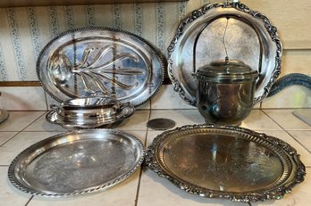 7 Serving Dishes, 4 Platters, Covered Hot-dish, Ice Bucket, Coaster.