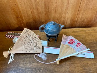 Lot Of Decorative Fans And Teapot
