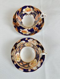 Two Royal Albert Cobalt And Gold Floral Cups And Saucers