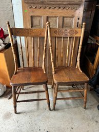 Two Vintage Press Back Oak Chairs