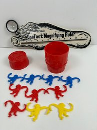 Barrel Of Monkeys And A One Foot Magnifying Ruler.