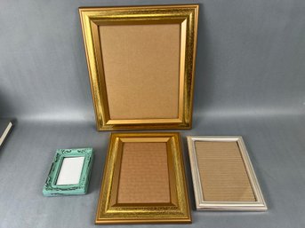 4 Picture Frames.