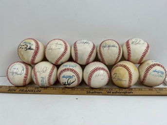 11 Autographed Baseballs.