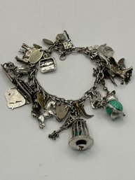 Vintage Sarah Coventry Sterling And Silver Tone Charm Bracelet