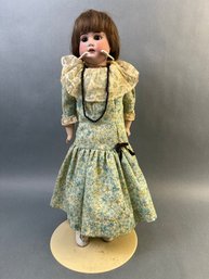 Antique Bisque Turned Head Doll.