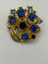 Gold Tone Brooch  With Blue Stones-  Made In Austria.