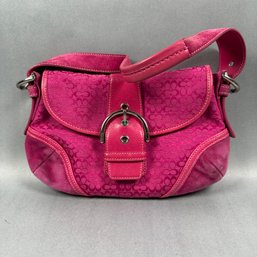Pink Coach Purse With Front Snap Closure