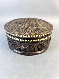 Intricately Carved Round Wood Box With Abalone Inlay.