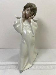 Lladro Angel With Hands Around Face.