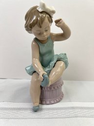 Lladro Girl Tying Ballet Slipper.