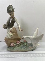 Lladro Girl With Egg Basket And Goose.