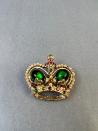 Gold Tone With Multi Color Glass Crown Brooch.
