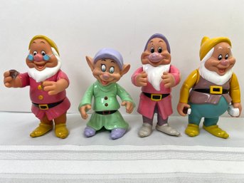 4 Vintage Vinyl Snow White Dwarf Figures.