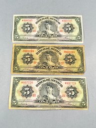 Three Cinco Pesos Bills