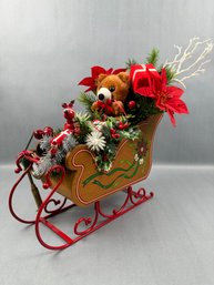 Christmas Sleigh Filled With Teddy And Gifts