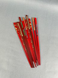 Grouping Of Vintage Red Painted Chopsticks